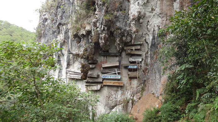 HANDGING: Hundreds of wooden coffins dangle from cliffs and caves in Sagada, Philippines.